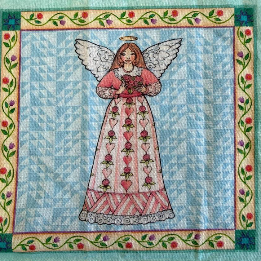Garden Angels cotton fabric panel with six floral angel blocks on teal background quilting panel