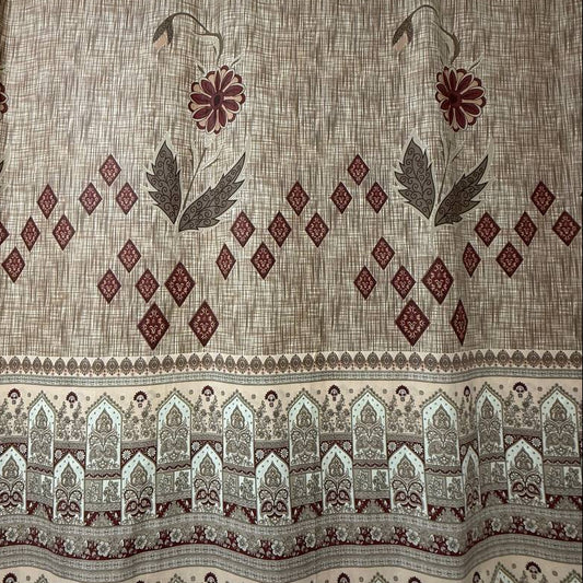Beige cotton sheeting fabric with burgundy floral motifs, geometric diamonds, and ornamental border design, 108 inch wide bedding fabric displayed at Sasha's Atelier