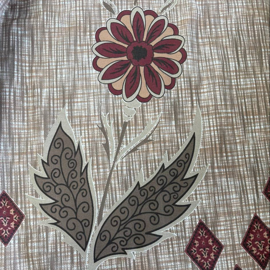 Beige cotton sheeting fabric with burgundy floral motifs, geometric diamonds, and ornamental border design, 108 inch wide bedding fabric displayed at Sasha's Atelier