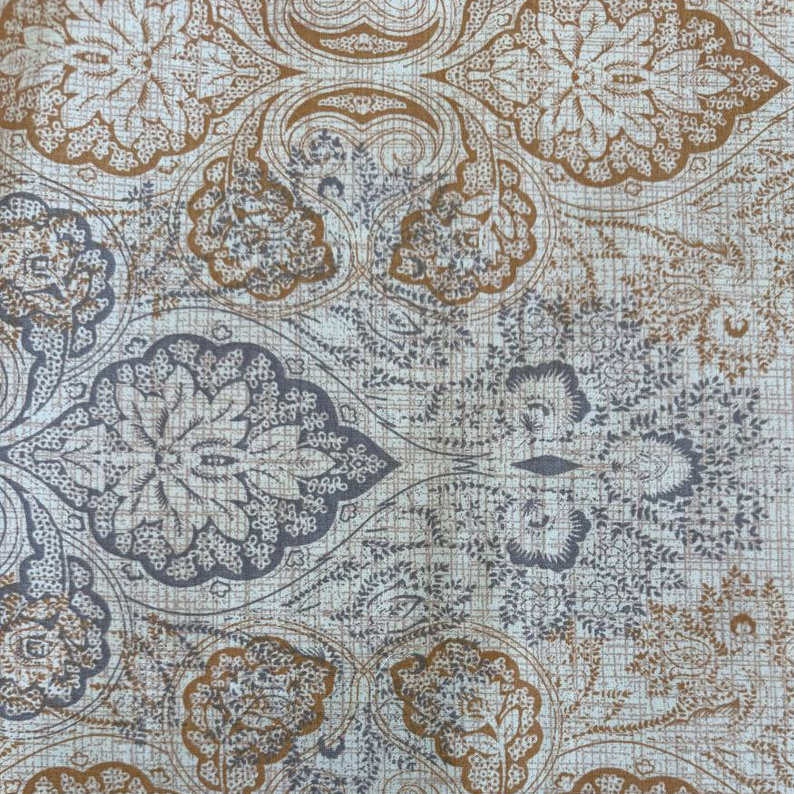 Vintage beige and grey medallion cotton sheeting fabric 108 inch wide folded stack