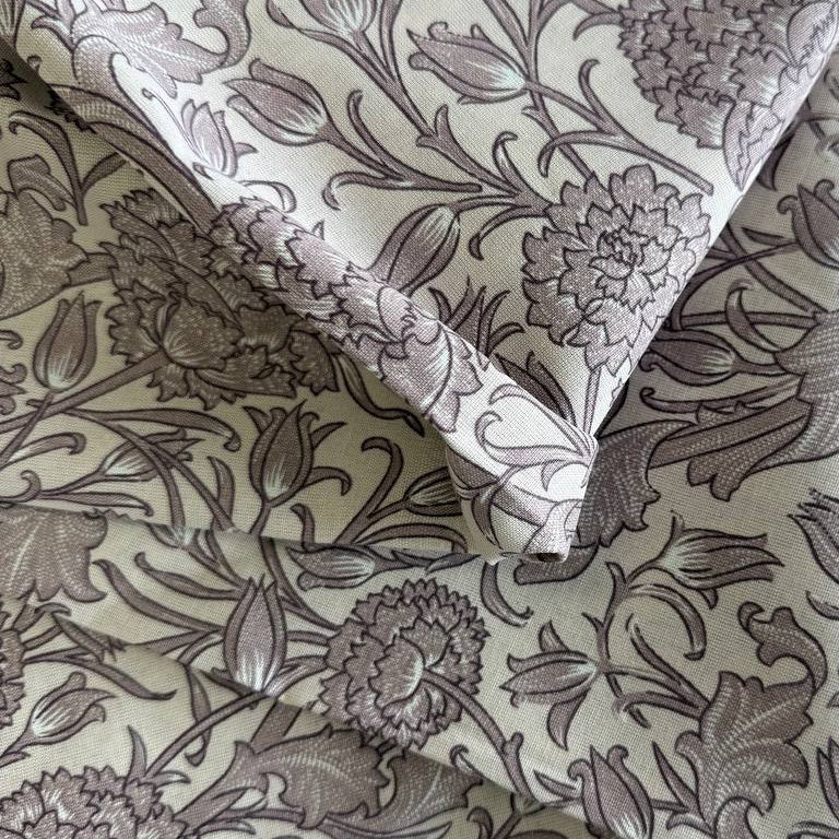 Taupe vintage floral cotton sheeting fabric with detailed flowers and vines on cream background 108 inch wide