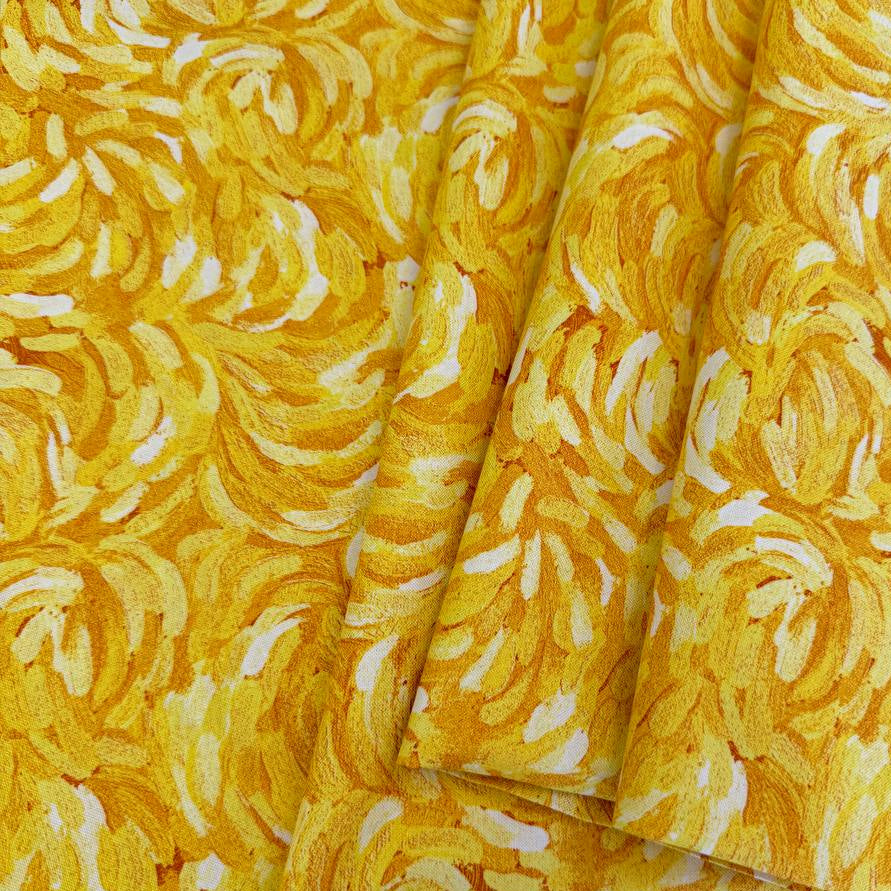 Northcott Starry Night Yellow 29264-52 100% cotton fabric featuring vibrant golden yellow, sunshine yellow and cream artistic brushstroke patterns.