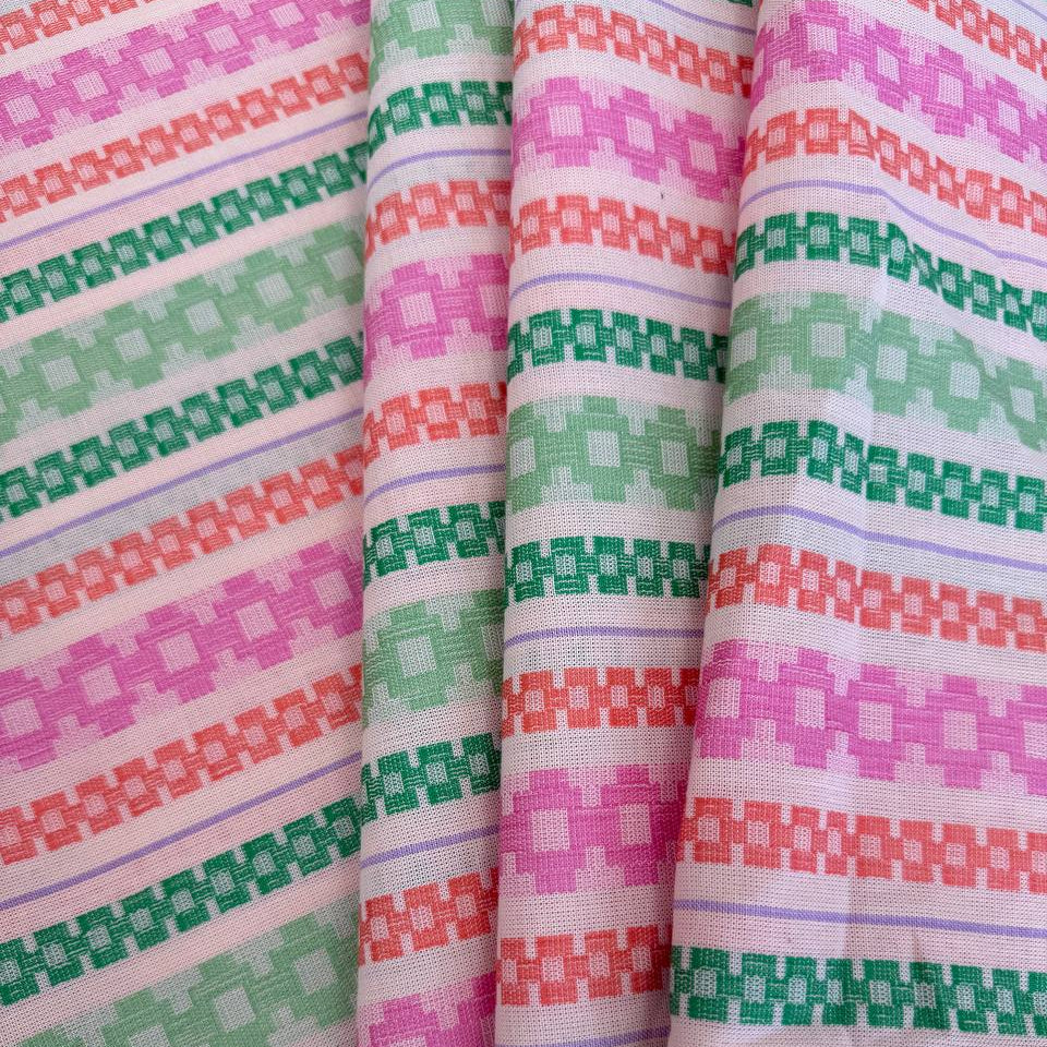 Anna Maria Textiles Journey Fruit 100% cotton fabric featuring colourful geometric stripes in pink, coral, mint green and lavender.