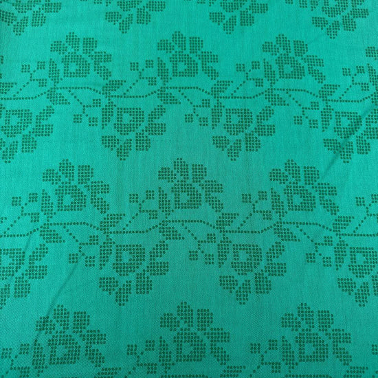 Journey by Anna Maria Textiles 100% cotton yarn-dyed fabric in Jam, Saffron, and Verdant colors with textured woven floral patterns.