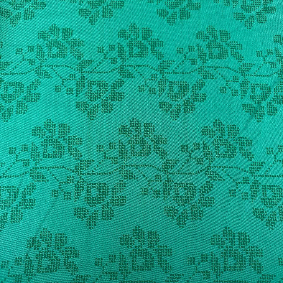 Journey by Anna Maria Textiles 100% cotton yarn-dyed fabric in Jam, Saffron, and Verdant colors with textured woven floral patterns.
