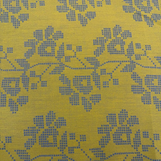 Journey by Anna Maria Textiles 100% cotton yarn-dyed fabric in Jam, Saffron, and Verdant colors with textured woven floral patterns.