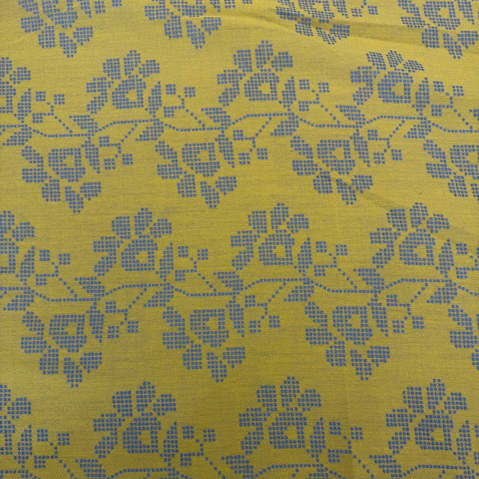 Journey by Anna Maria Textiles 100% cotton yarn-dyed fabric in Jam, Saffron, and Verdant colors with textured woven floral patterns.