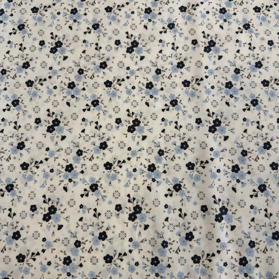 Blue floral cotton fabric by Moda Sun Drenched collection on cream background
