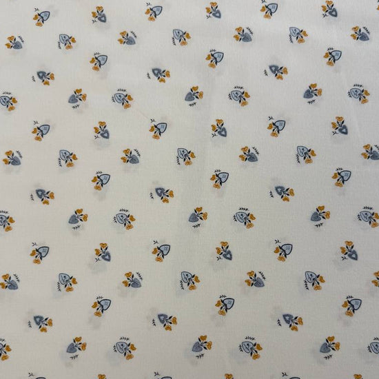 Delicate floral cotton fabric on soft ivory background with mustard and blue flowers – Moda Sun Drenched collection