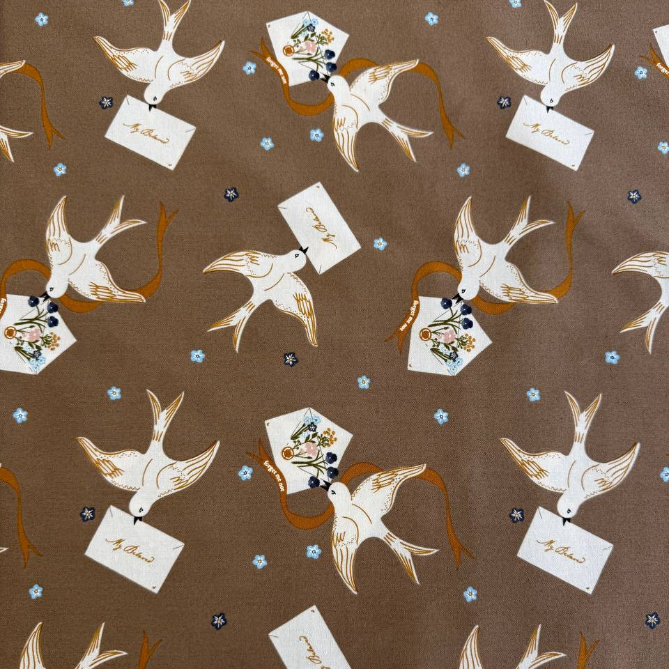 Bird print cotton fabric in teak brown with floral accents by Moda Enchantment collection