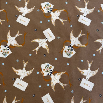Bird print cotton fabric in teak brown with floral accents by Moda Enchantment collection