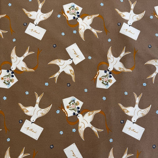 Bird print cotton fabric in teak brown with floral accents by Moda Enchantment collection