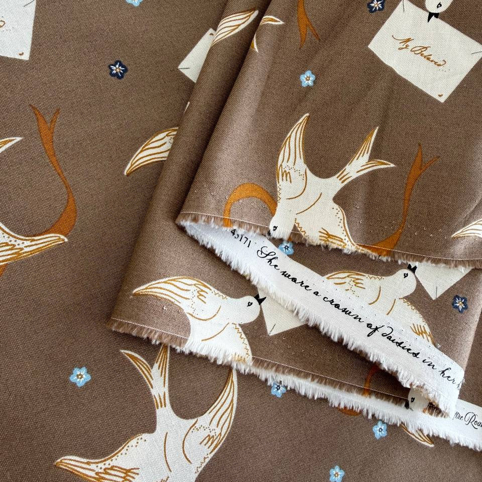 Bird print cotton fabric in teak brown with floral accents by Moda Enchantment collection