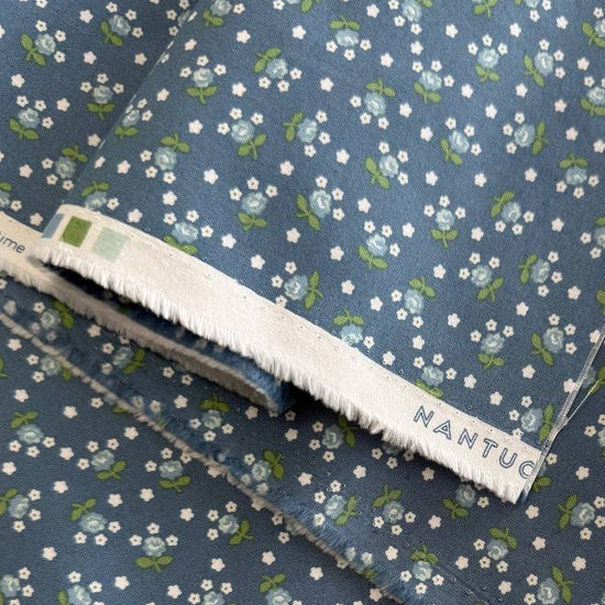 Moda Nantucket Summer blue cotton fabric with small white and green floral print