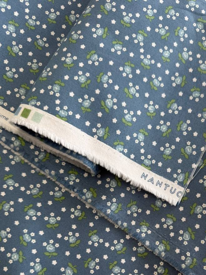 Moda Nantucket Summer blue cotton fabric with small white and green floral print