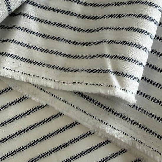 Moda Sun Drenched striped cotton fabric in Indigo and Cloud Indigo colors