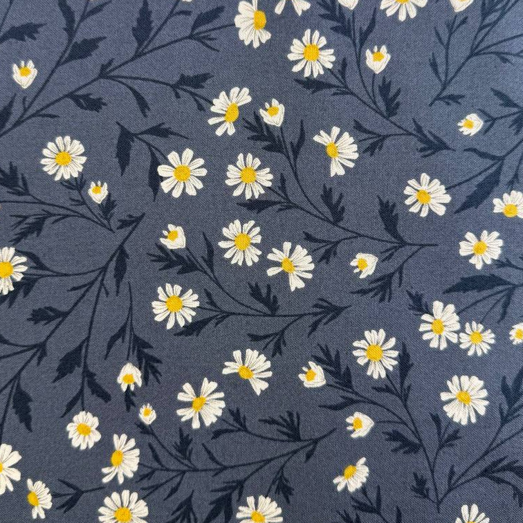 Dark blue cotton fabric with daisy floral print