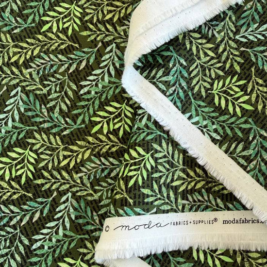 Moda Paper Hamlet Midnight leaf print cotton fabric with green botanical pattern on dark blue background