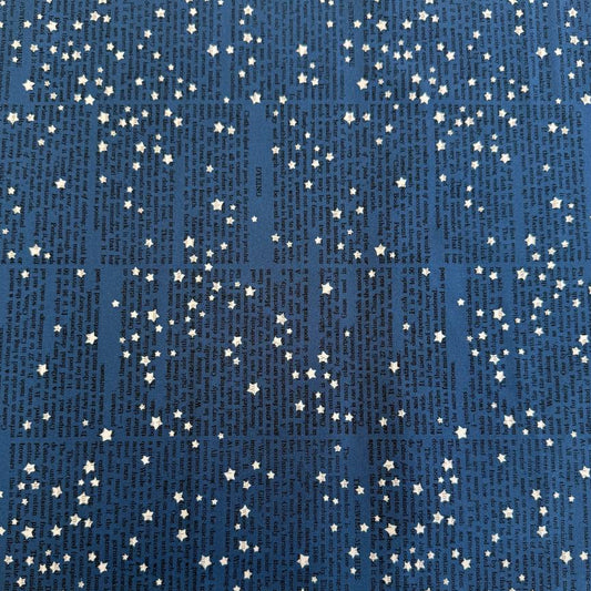 Midnight blue cotton fabric with vintage text print and scattered ivory stars from Paper Hamlet collection by Moda