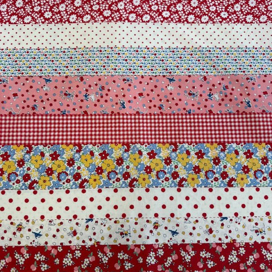 Vintage style patchwork stripe cotton fabric with florals, polka dots and gingham in red and pink tones from 30s Playtime collection by Moda