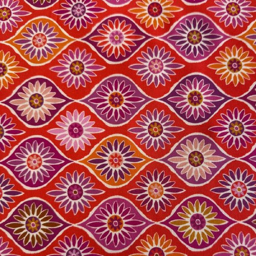 Bright mandarin floral quilting cotton fabric with pink and plum flowers geometric pattern by Moda