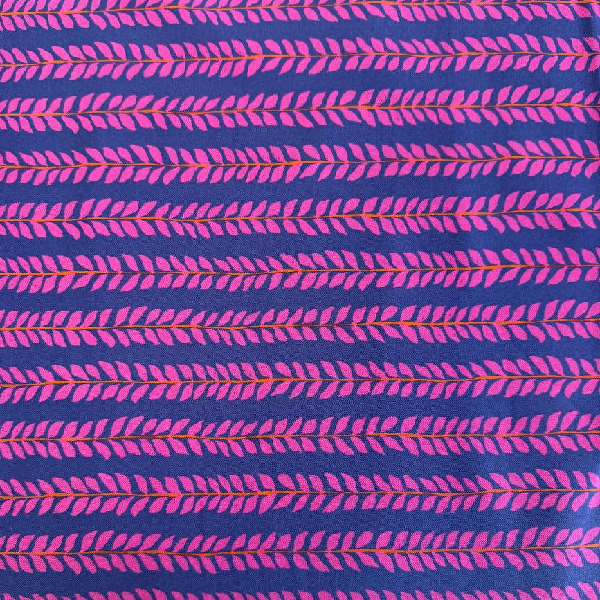 Navy cotton fabric with pink leaf pattern by Crystal Manning for Moda
