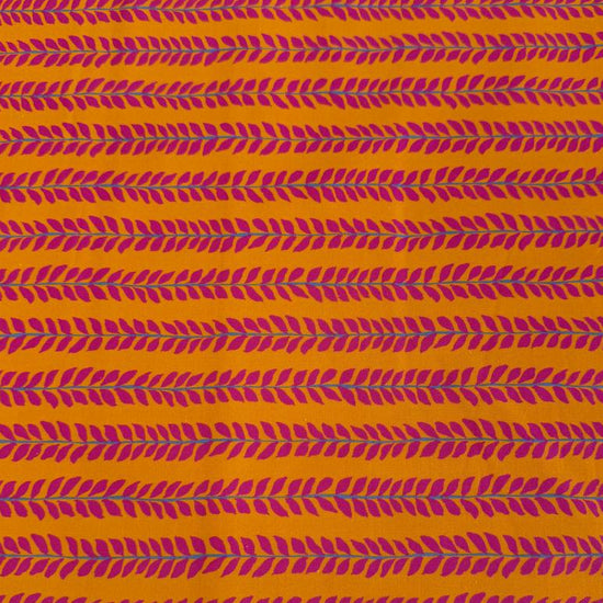 Mustard cotton fabric with pink leaf pattern by Crystal Manning for Moda