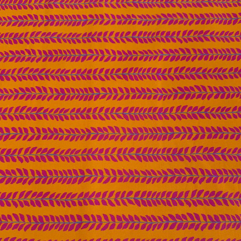 Mustard cotton fabric with pink leaf pattern by Crystal Manning for Moda