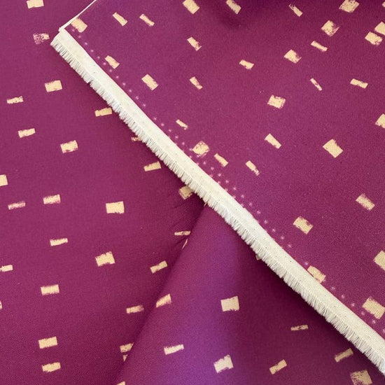 Cyclamen pink cotton fabric with metallic gold dash pattern by Moda Maeve collection
