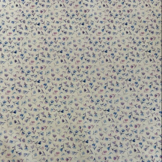Delphinium floral cotton fabric by Janet Clare for Moda in ivory with delicate pastel floral print