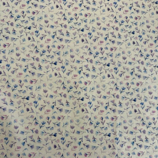 Delphinium floral cotton fabric by Janet Clare for Moda in ivory with delicate pastel floral print