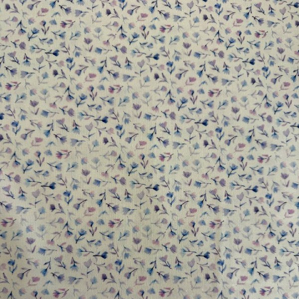 Delphinium floral cotton fabric by Janet Clare for Moda in ivory with delicate pastel floral print