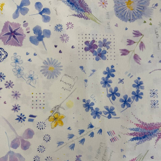 Delphinium Snowdrop floral cotton fabric by Jane Clare for Moda with soft purple and blue flowers on cream background
