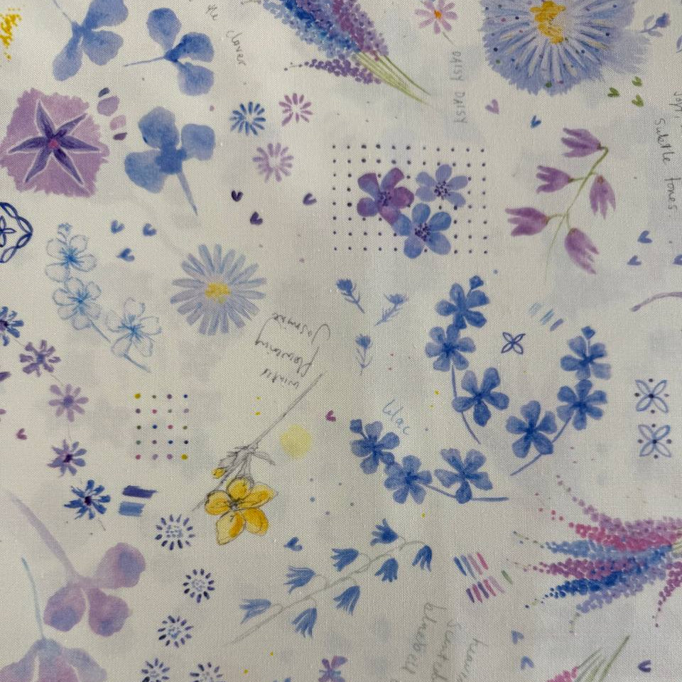 Delphinium Snowdrop floral cotton fabric by Jane Clare for Moda with soft purple and blue flowers on cream background