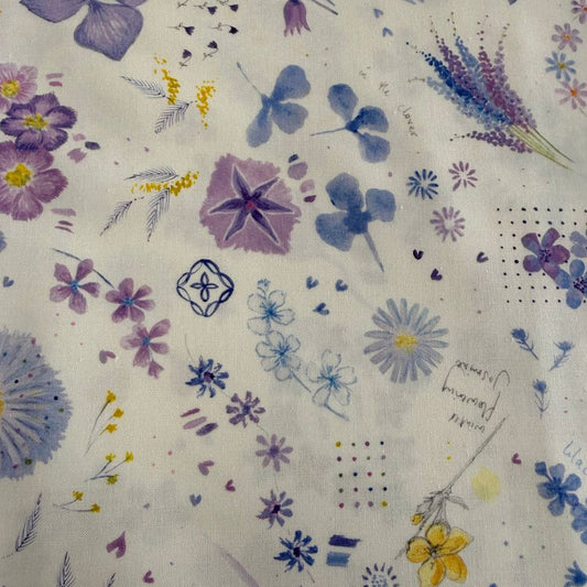 Delphinium Snowdrop floral cotton fabric by Jane Clare for Moda with soft purple and blue flowers on cream background