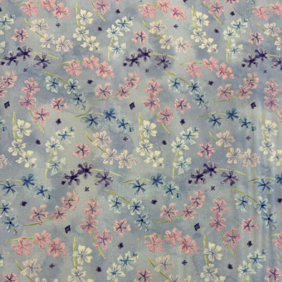 Delphinium Bluebell floral cotton fabric with pink and blue flowers on light blue background