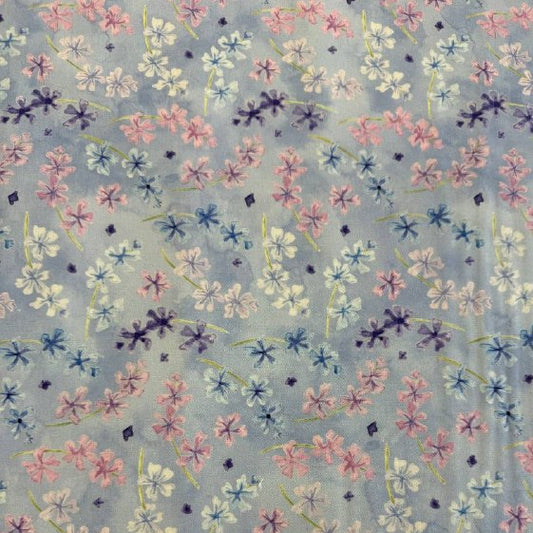 Delphinium Bluebell floral cotton fabric with pink and blue flowers on light blue background