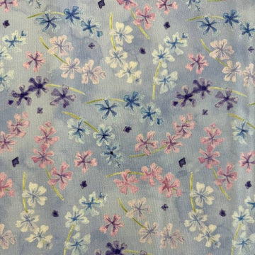 Delphinium Bluebell floral cotton fabric with pink and blue flowers on light blue background