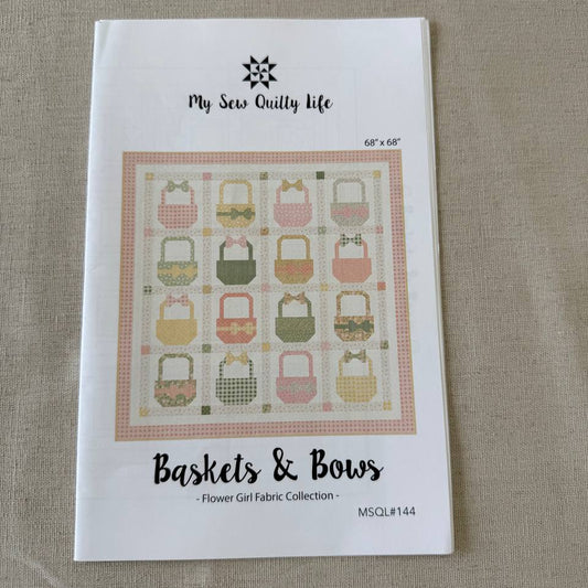 Baskets and Bows quilt pattern featuring pastel basket blocks with bows