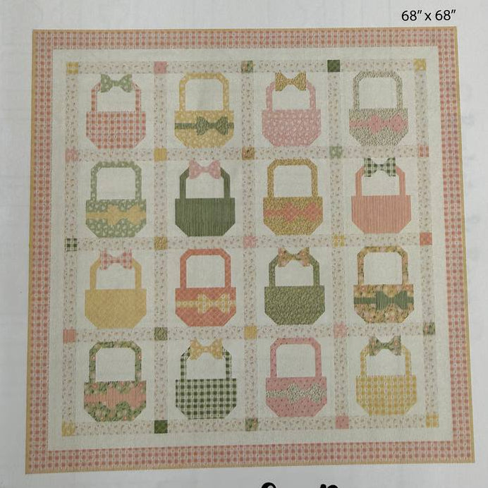 Baskets and Bows quilt pattern featuring pastel basket blocks with bows