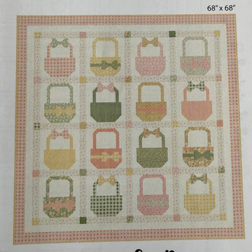 Baskets and Bows quilt pattern featuring pastel basket blocks with bows