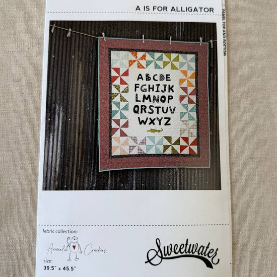 ABC baby quilt pattern with alphabet letters and colorful patchwork border Sweetwater