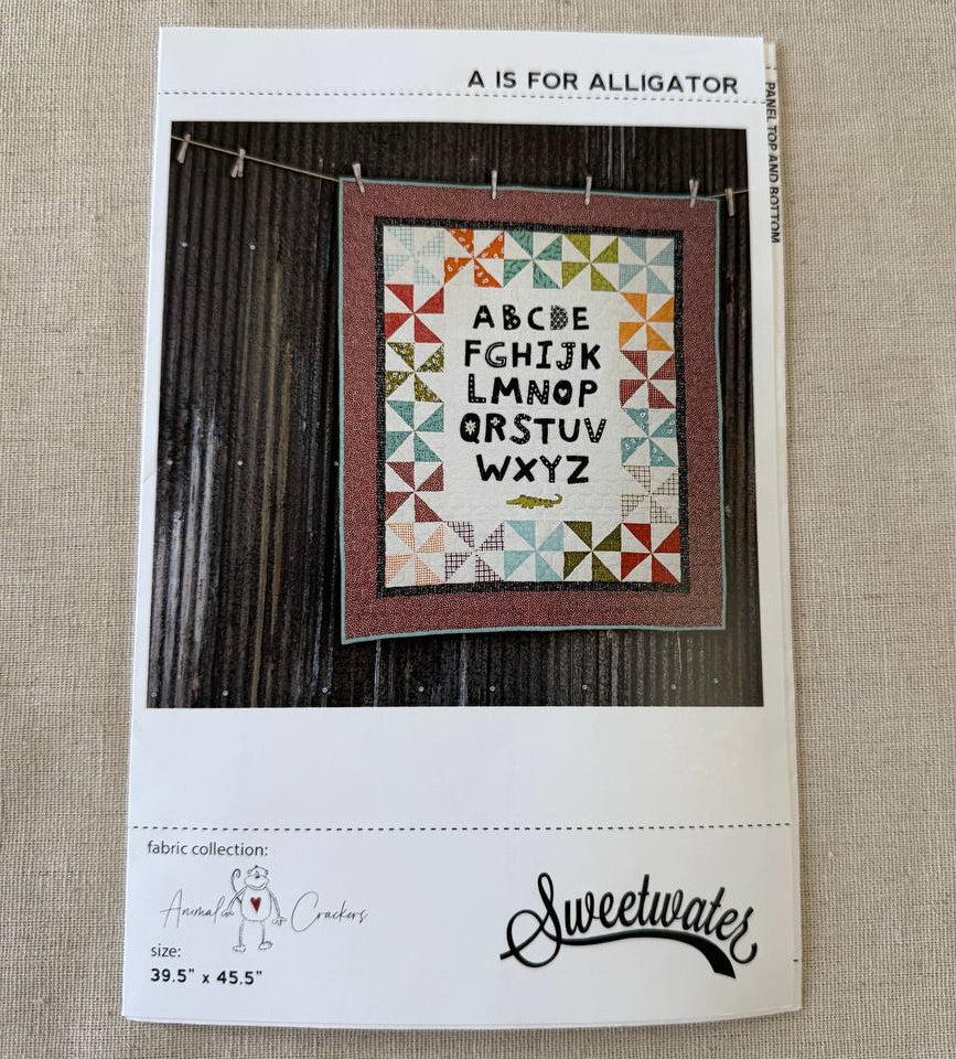 ABC baby quilt pattern with alphabet letters and colorful patchwork border Sweetwater