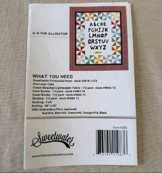 ABC baby quilt pattern with alphabet letters and colorful patchwork border Sweetwater