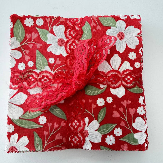 Love Blooms charm pack red floral quilting cotton squares with lace ribbon