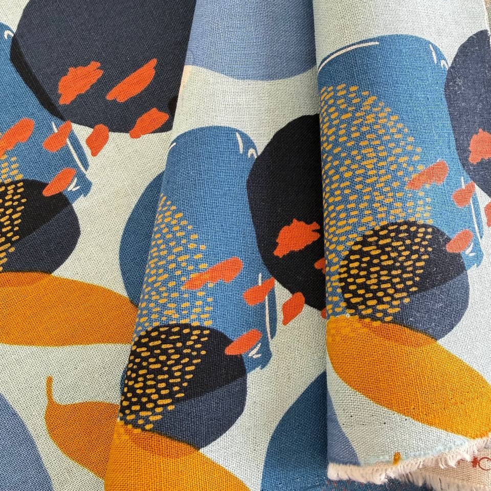 Blue abstract linen fabric with modern geometric pattern