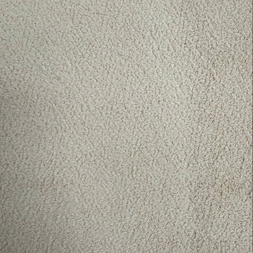Natural beige sherpa fleece fabric with soft plush texture