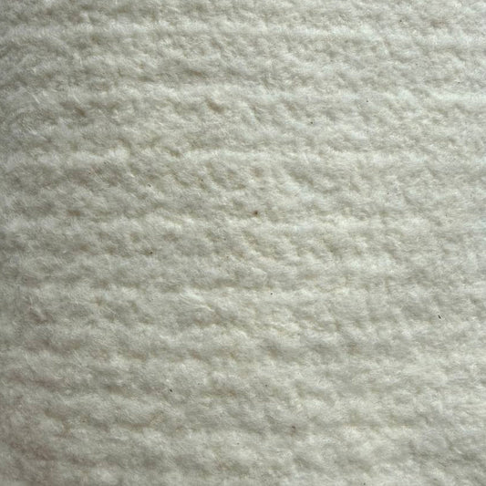 Poly linen batting fabric with soft, lofty texture in natural off-white color