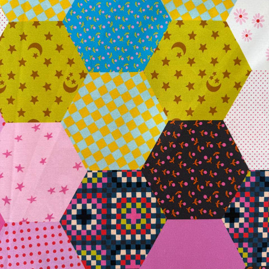 Catnap 108 inch patchwork cotton fabric with colorful geometric and star patterns
