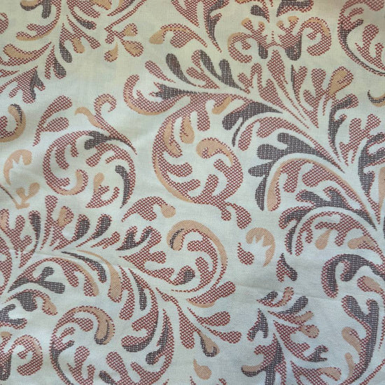 Durable decorative fabric with a woven texture and structured feel.